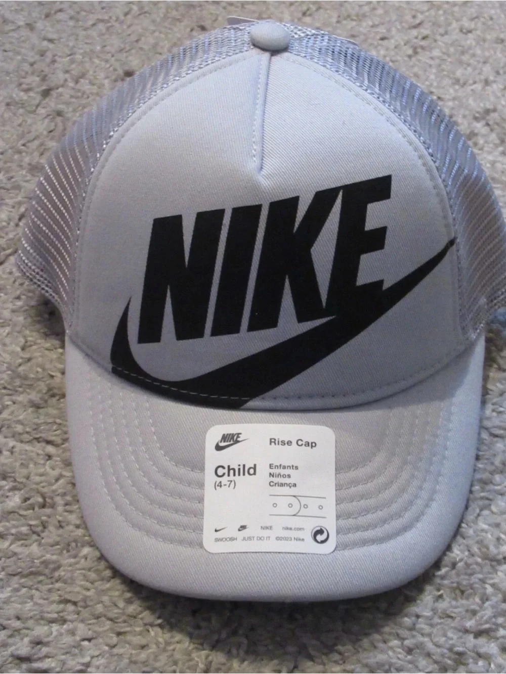 Nike Silver Mesh Trucker Hat with Black Logo Tag